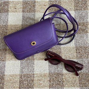 Coach sunglasses with a small pochette